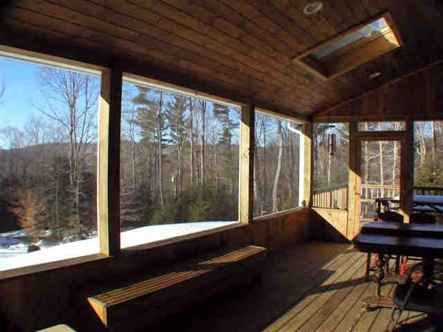 112 Hammertown Road Sandisfield, MA 01255 - Photo 2 of 8 a view of a room with wooden floor and outdoor seating