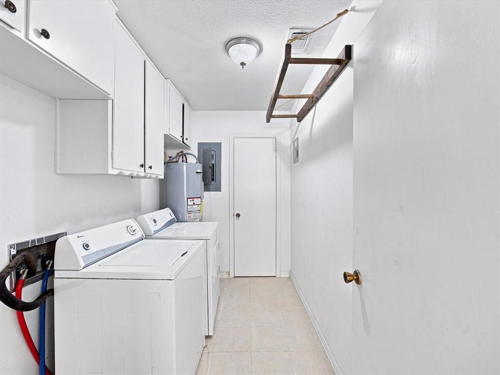 3107 South Lipsey Street Decatur, TX 76234 - Photo 9 of 40 Notice the cabinets and drying rack