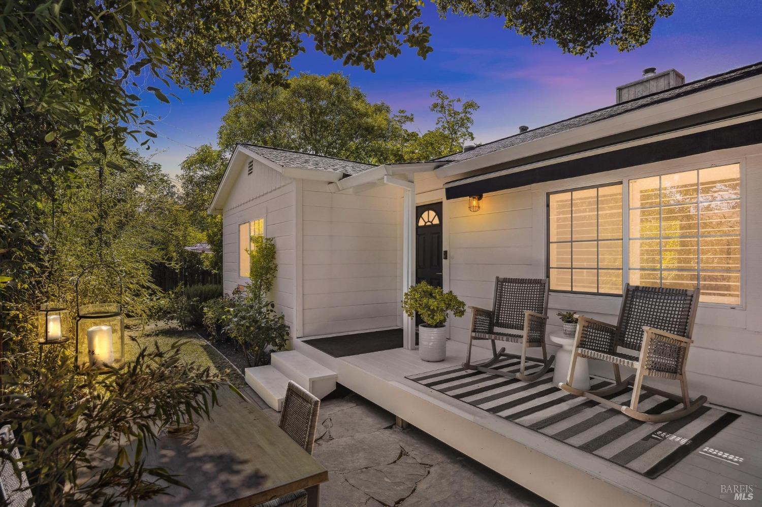 a view of backyard with a patio