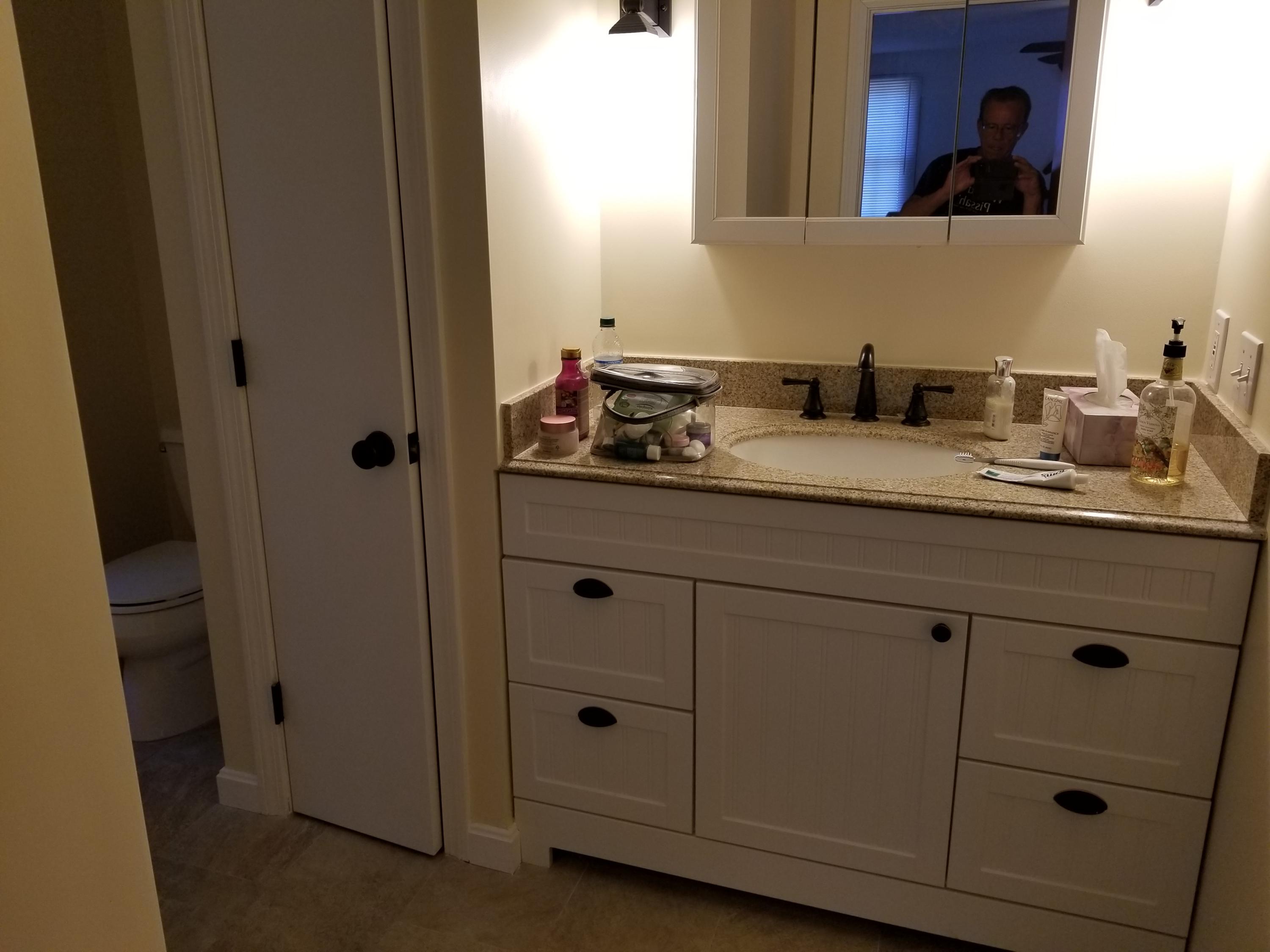 50 Nearmeadows Road West Yarmouth, MA 02673 - Photo 17 of 20 a bathroom with a sink and mirror