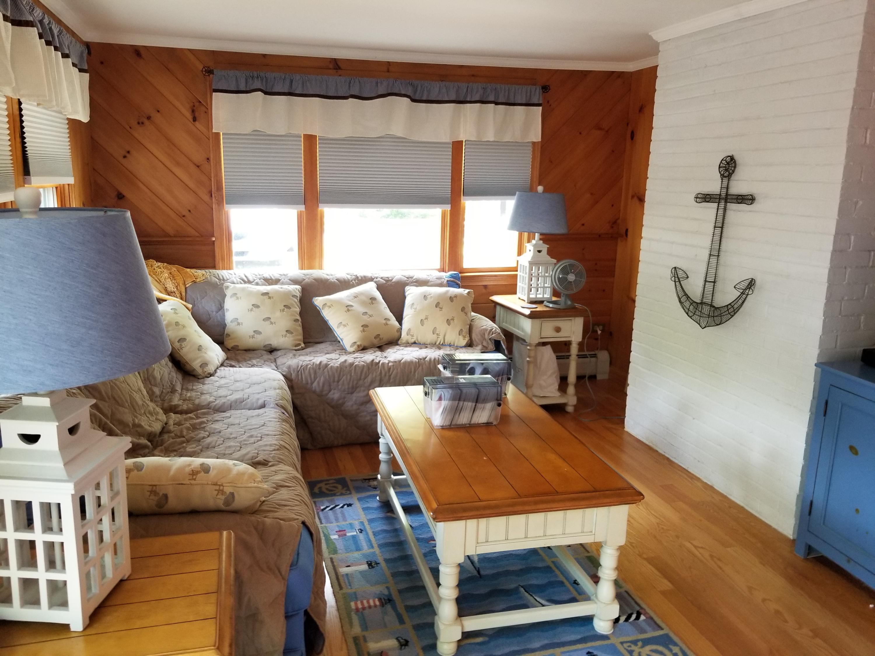 50 Nearmeadows Road West Yarmouth, MA 02673 - Photo 5 of 20 a living room with furniture and a window
