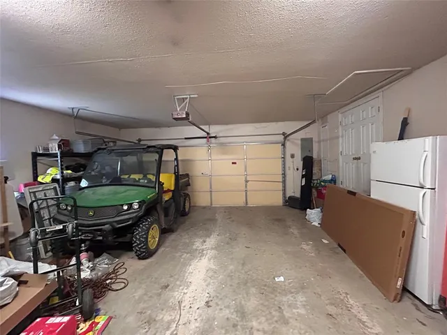 a room with storage and a fireplace