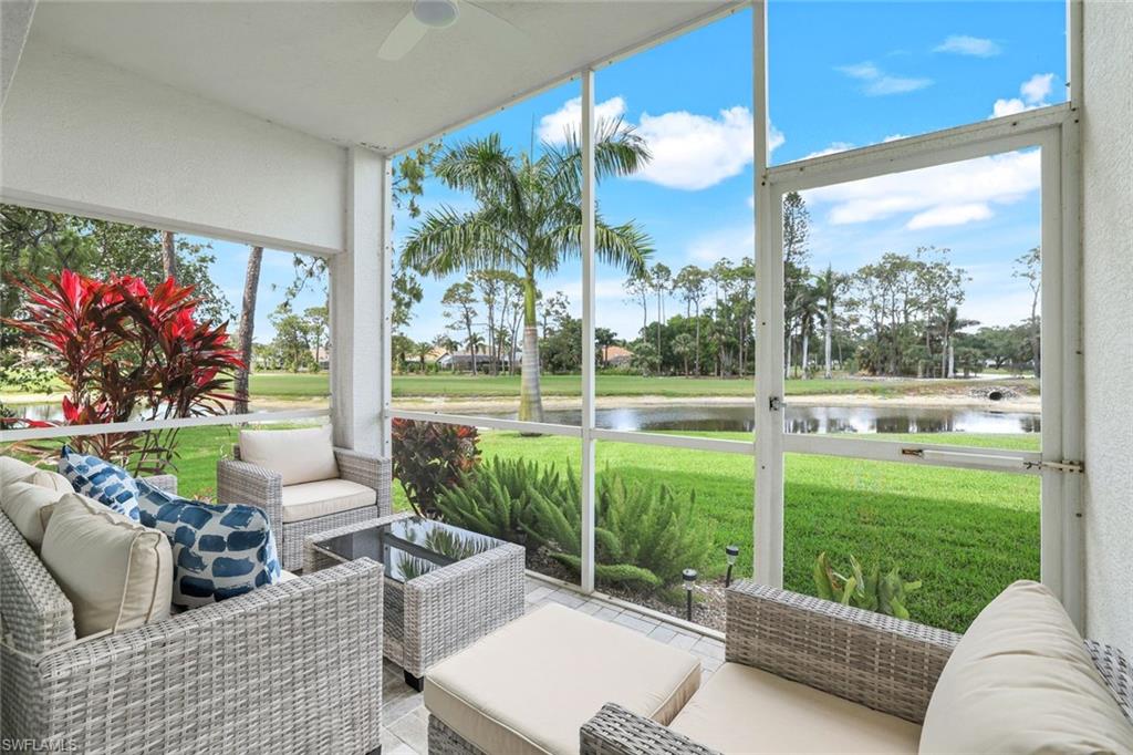 555 Augusta Boulevard, Unit 31 Naples, FL 34113 - Photo 14 of 17 Sunroom / solarium featuring outdoor lounge area, a water view, and ceiling fan
