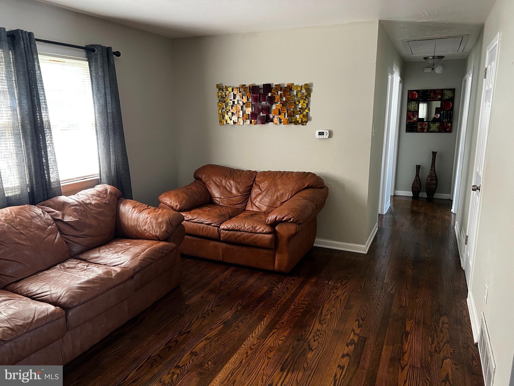 122 Harvard Road Pennsville, NJ 08070 - Photo 4 of 16 Living Room w/ Hallway
