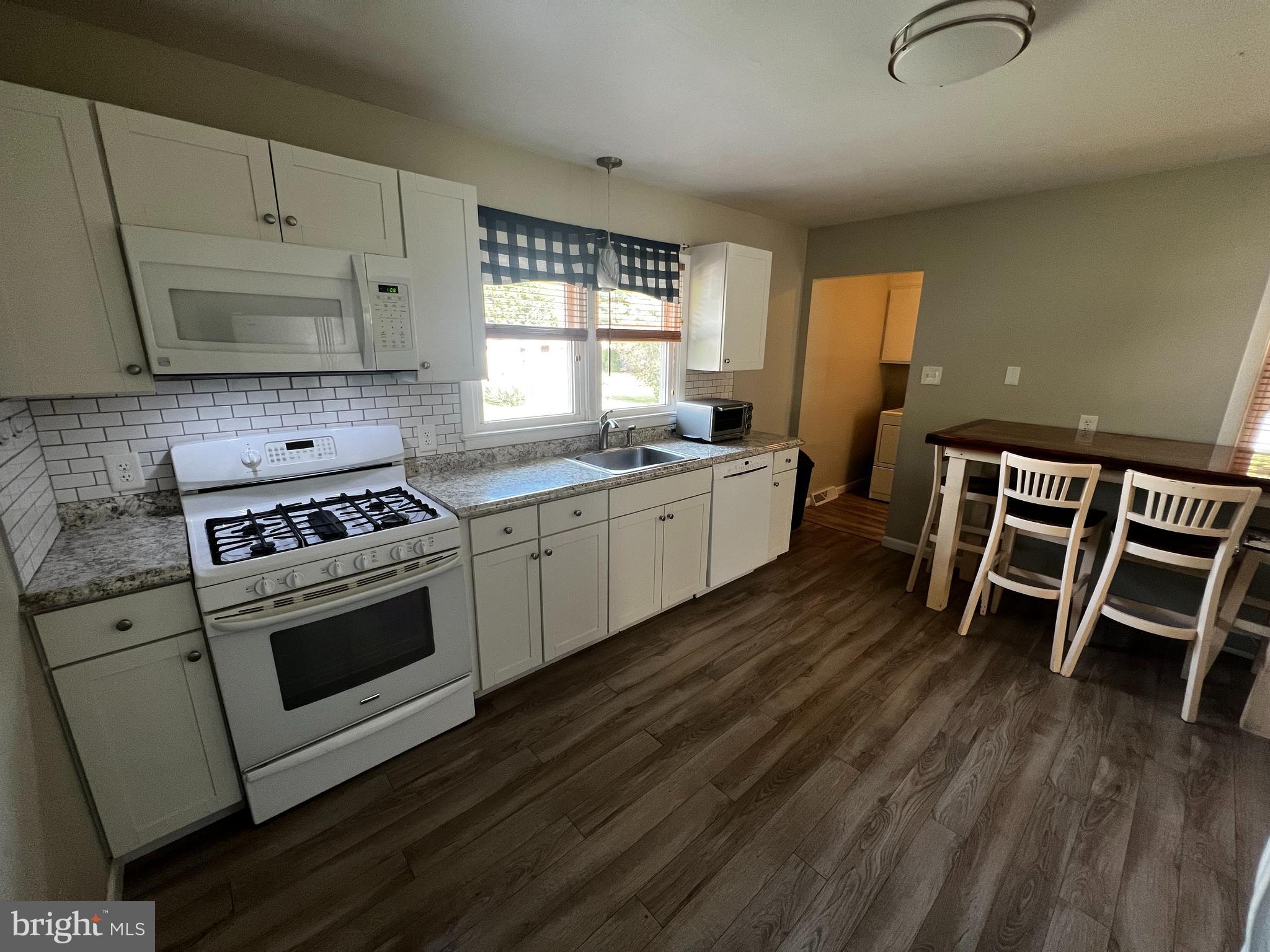 122 Harvard Road Pennsville, NJ 08070 - Photo 8 of 16 Kitchen w/ Laundry Room View