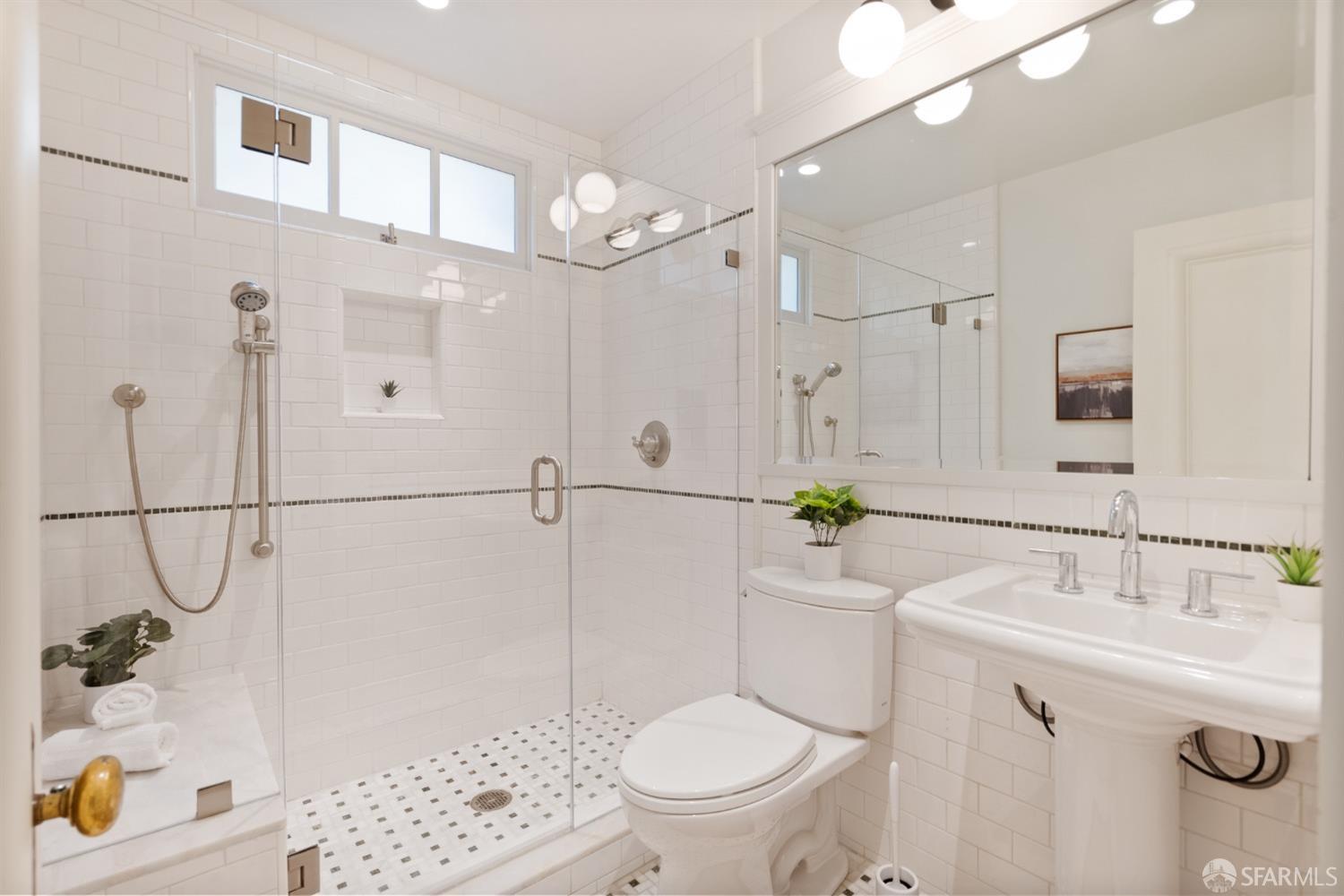 2728 Claremont Boulevard Berkeley, CA 94705 - Photo 18 of 55 a bathroom with a sink a toilet and shower