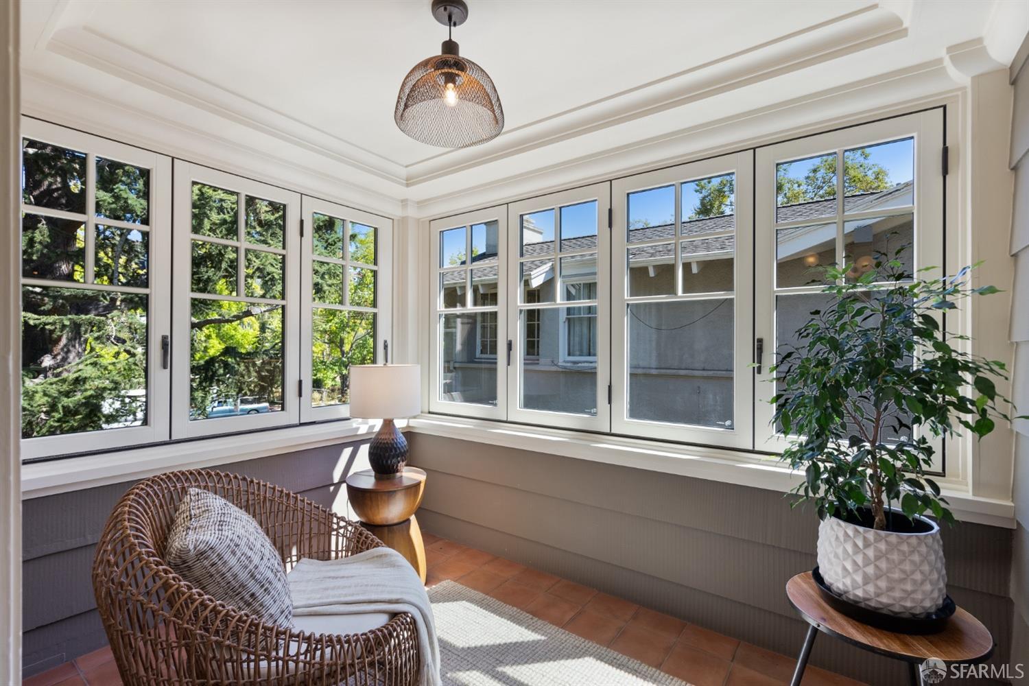 2728 Claremont Boulevard Berkeley, CA 94705 - Photo 36 of 55 a living room with furniture and a potted plant