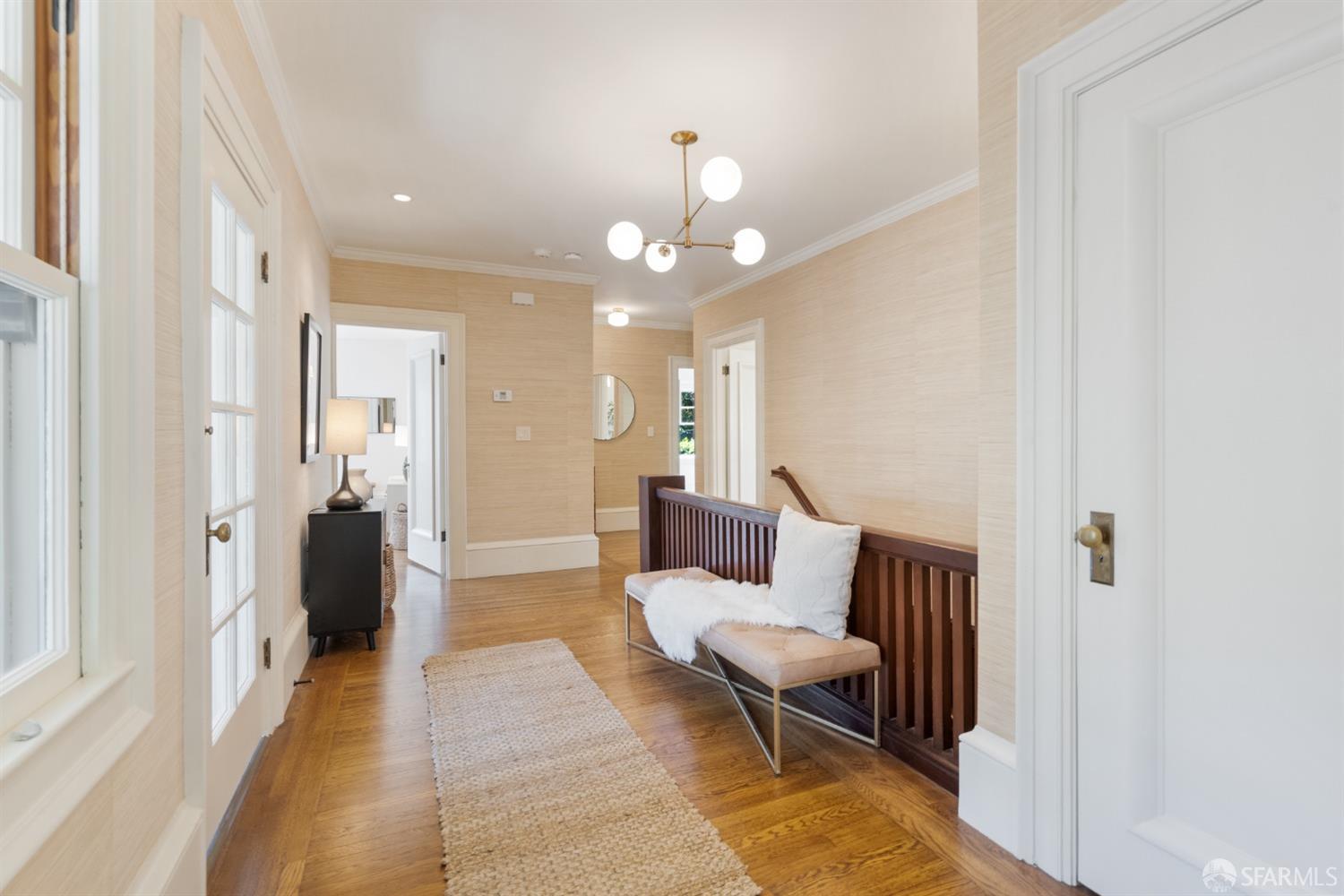 2728 Claremont Boulevard Berkeley, CA 94705 - Photo 39 of 55 a living room with furniture and a chandelier