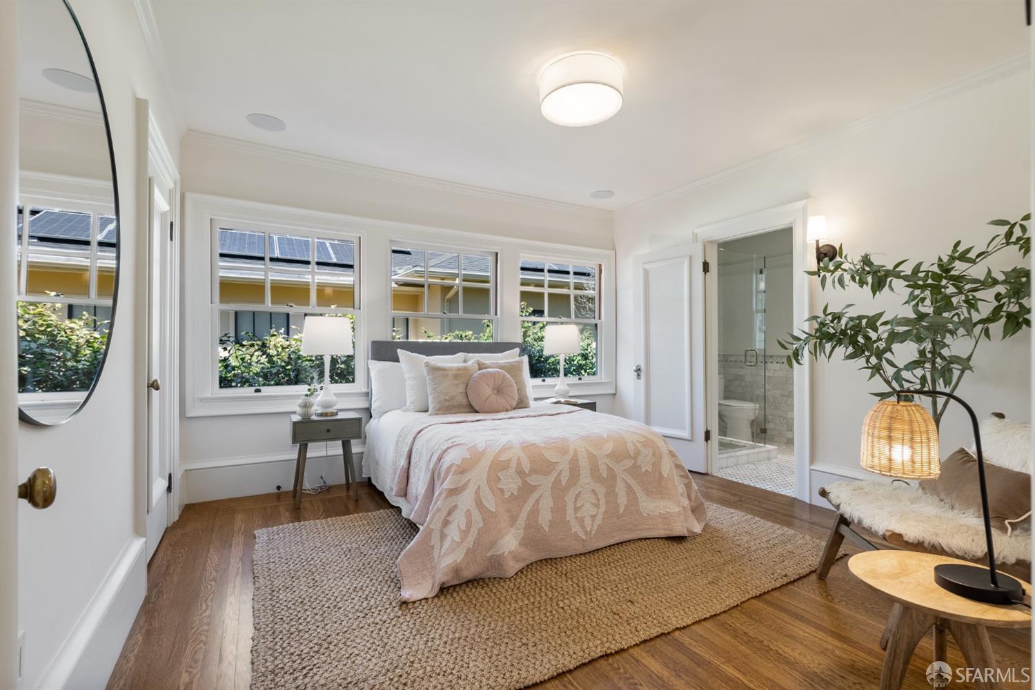 2728 Claremont Boulevard Berkeley, CA 94705 - Photo 44 of 55 a bedroom with a bed and large windows