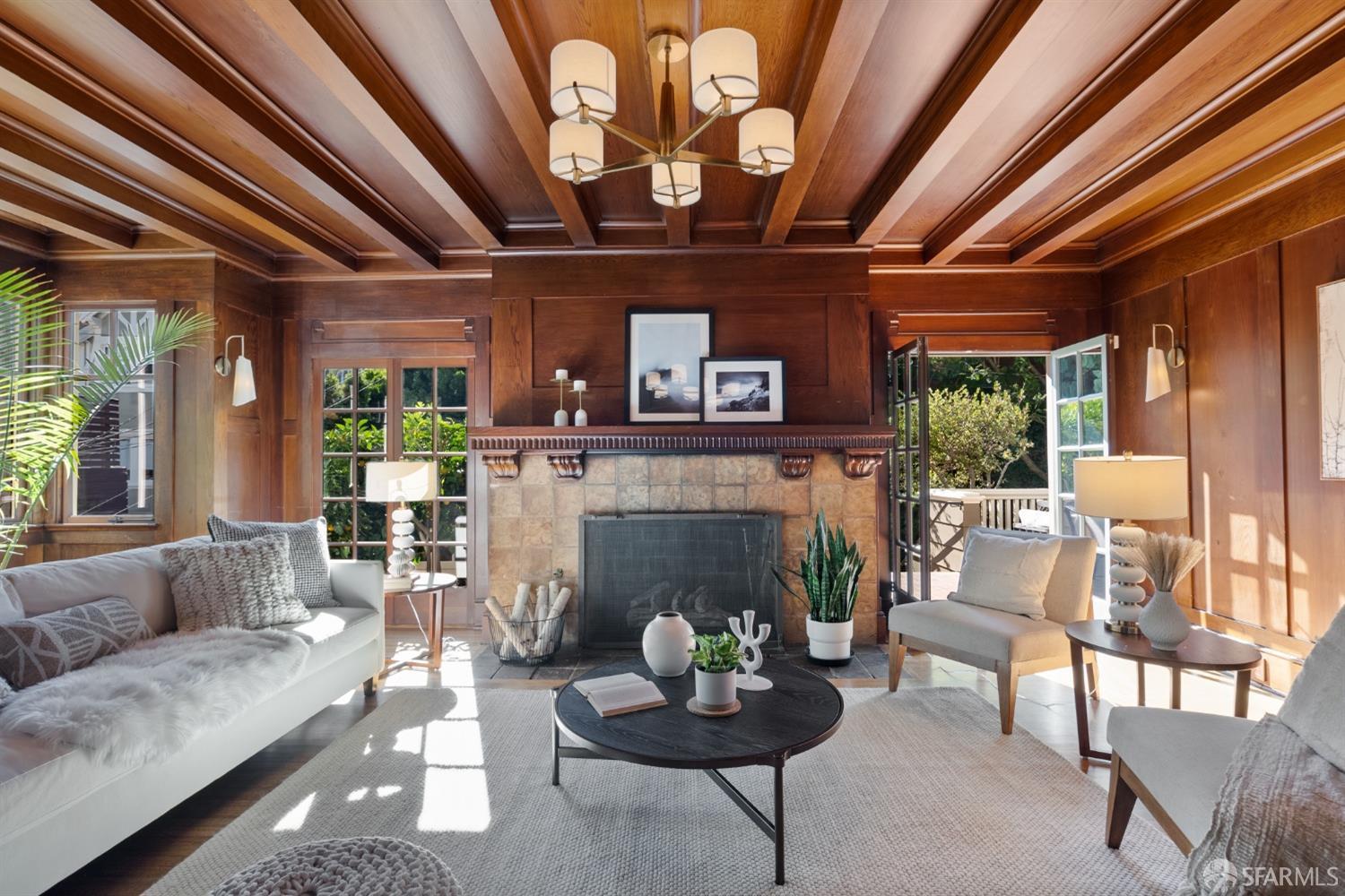 2728 Claremont Boulevard Berkeley, CA 94705 - Photo 7 of 55 a living room with furniture a fireplace and a table