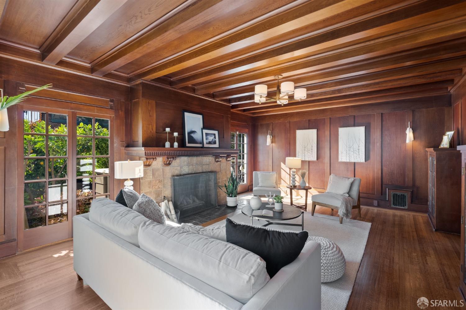 2728 Claremont Boulevard Berkeley, CA 94705 - Photo 10 of 55 a living room with furniture and a fireplace
