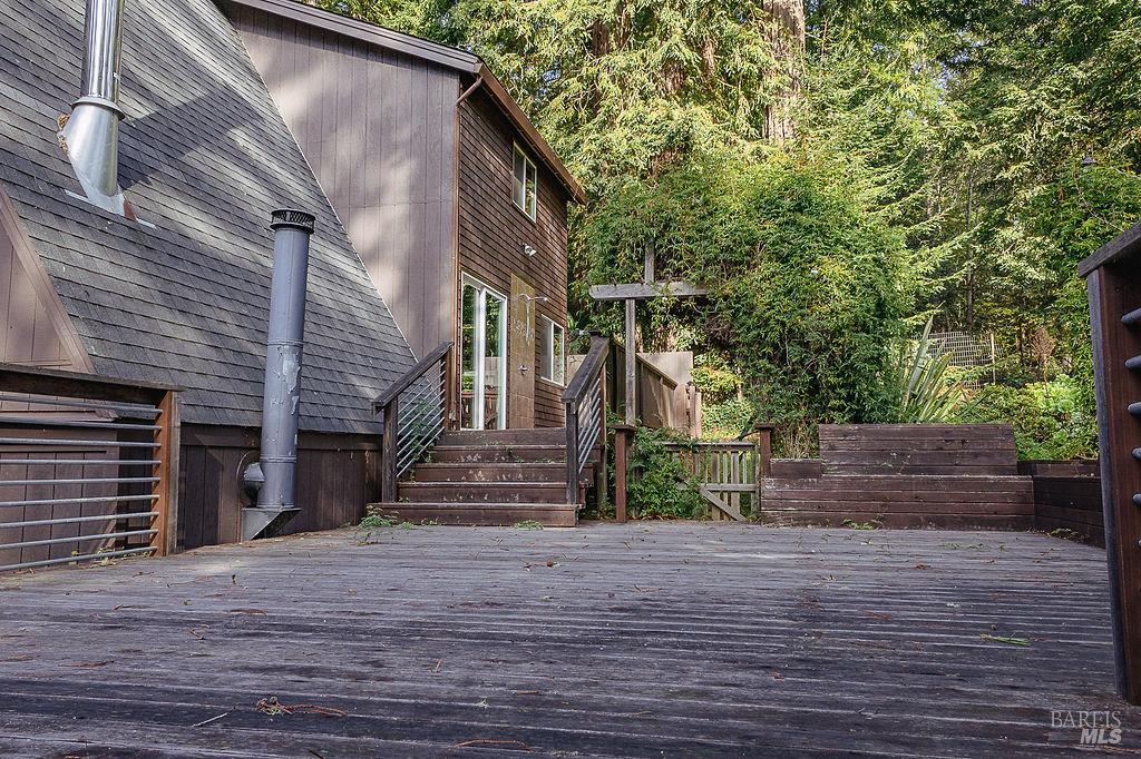 46151 Pacific Woods Road Gualala, CA 95445 - Photo 20 of 25 a view of street along with house and trees