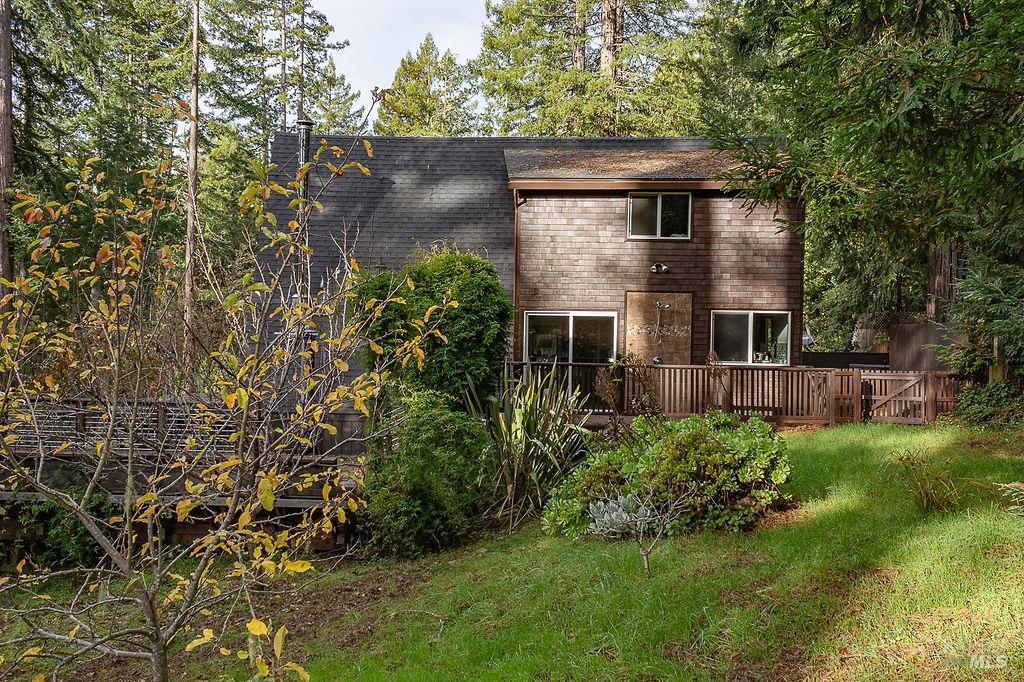 46151 Pacific Woods Road Gualala, CA 95445 - Photo 4 of 25 front view of a house with a yard