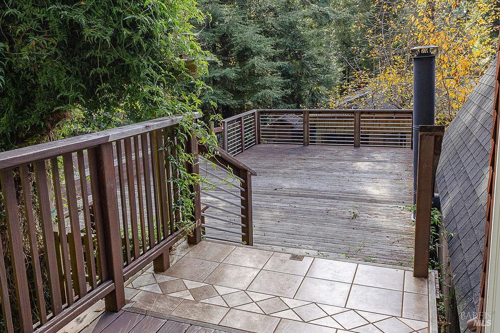 46151 Pacific Woods Road Gualala, CA 95445 - Photo 5 of 25 a view of wooden fence and a bench