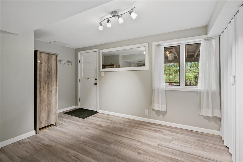 5431 Hamilton Road Gibsonia, PA 15044 - Photo 20 of 28 wooden floor in an empty room with a window
