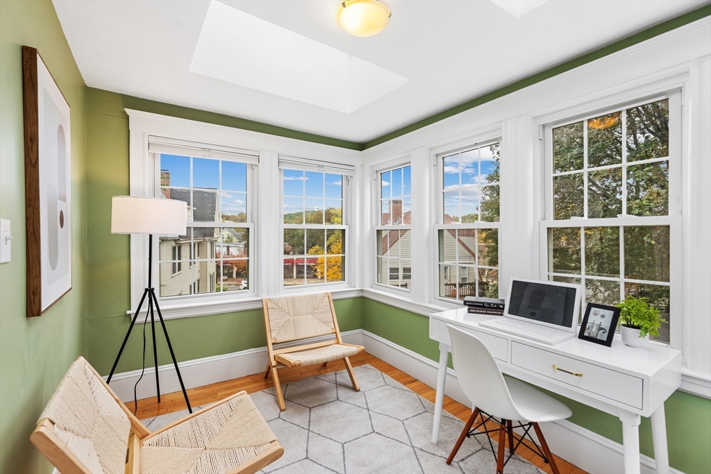 6 Appleton Place Arlington, MA 02476 - Photo 19 of 36 a living room with furniture and a window