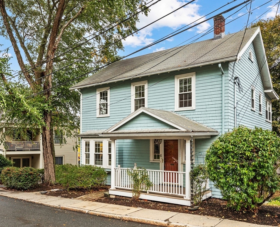 6 Appleton Place Arlington, MA 02476 - Photo 2 of 36 a front view of a house with a garden
