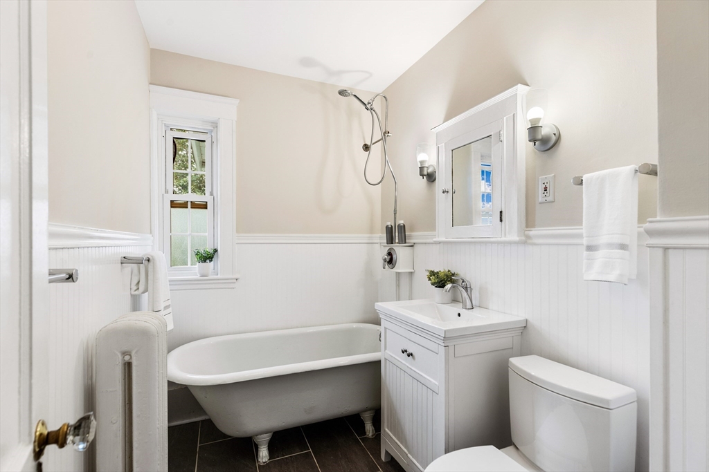 6 Appleton Place Arlington, MA 02476 - Photo 24 of 36 a bathroom with a sink mirror toilet and bathtub