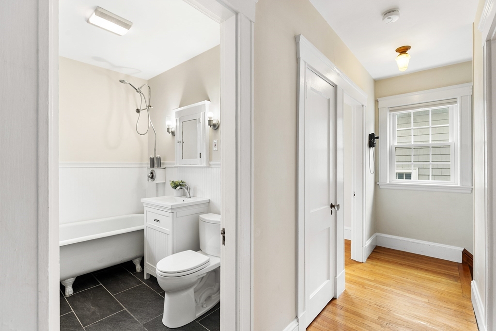 6 Appleton Place Arlington, MA 02476 - Photo 25 of 36 a bathroom with a sink toilet tub and shower