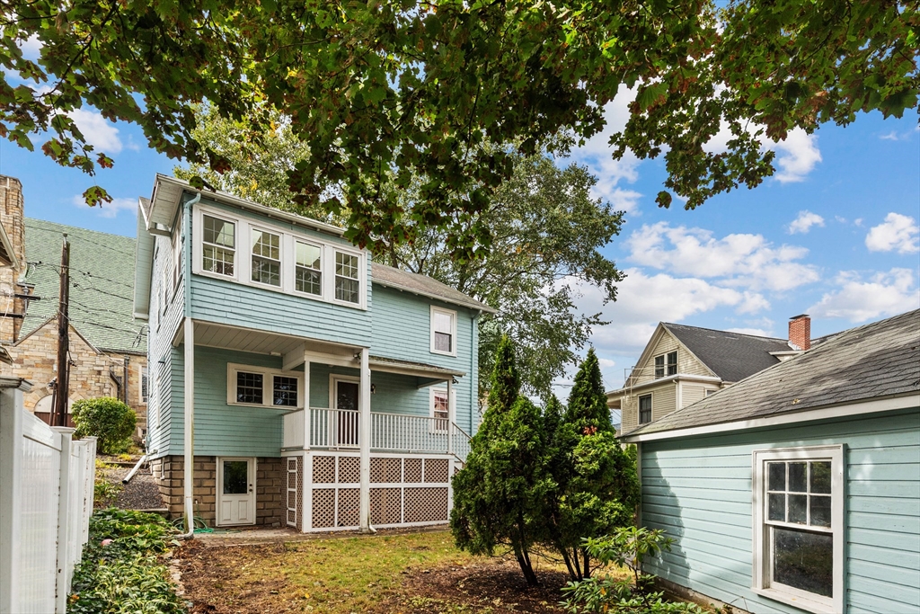 6 Appleton Place Arlington, MA 02476 - Photo 28 of 36 a front view of a house with a garden