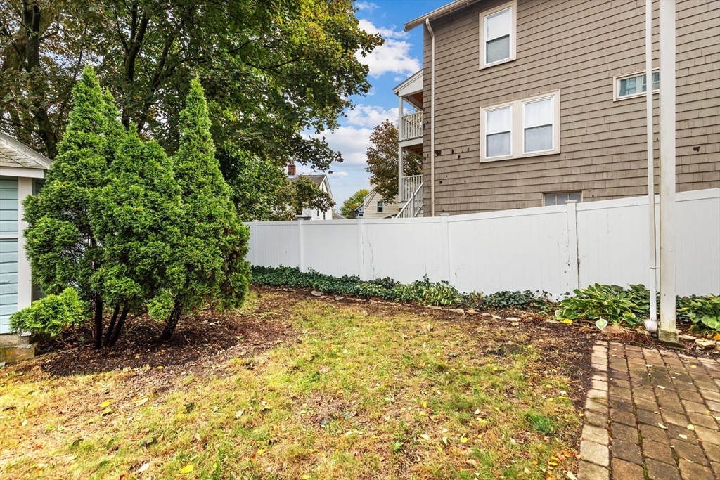 6 Appleton Place Arlington, MA 02476 - Photo 32 of 36 a backyard of a house
