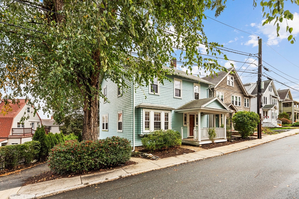 6 Appleton Place Arlington, MA 02476 - Photo 33 of 36 a front view of a house with a yard