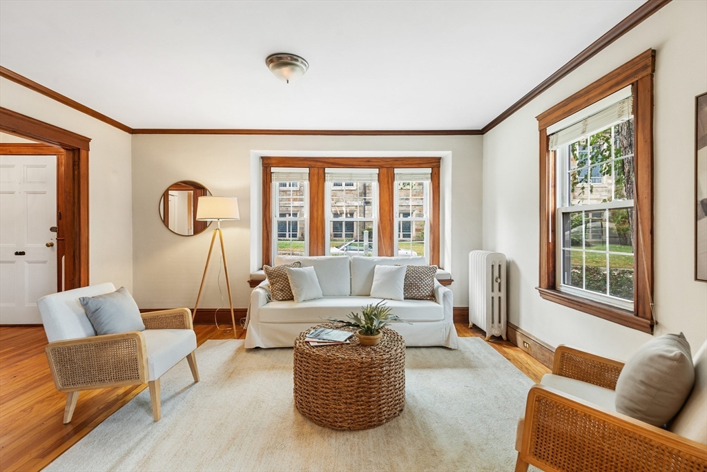 6 Appleton Place Arlington, MA 02476 - Photo 6 of 36 a living room with furniture and a large window