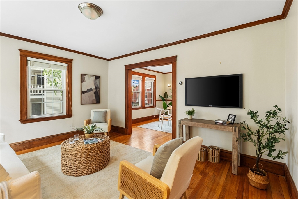 6 Appleton Place Arlington, MA 02476 - Photo 7 of 36 a living room with furniture and a flat screen tv