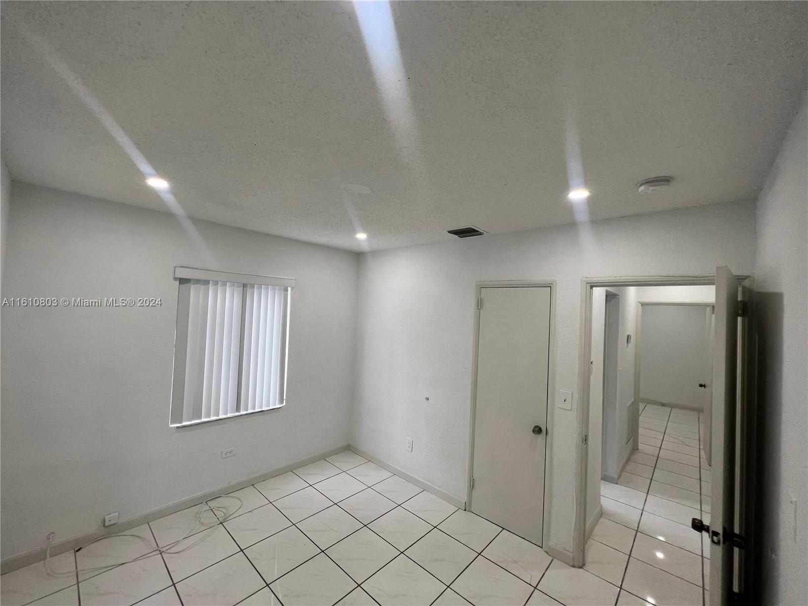 3052 Southwest 6th Street Miami, FL 33135 - Photo 13 of 17 a view of an empty room