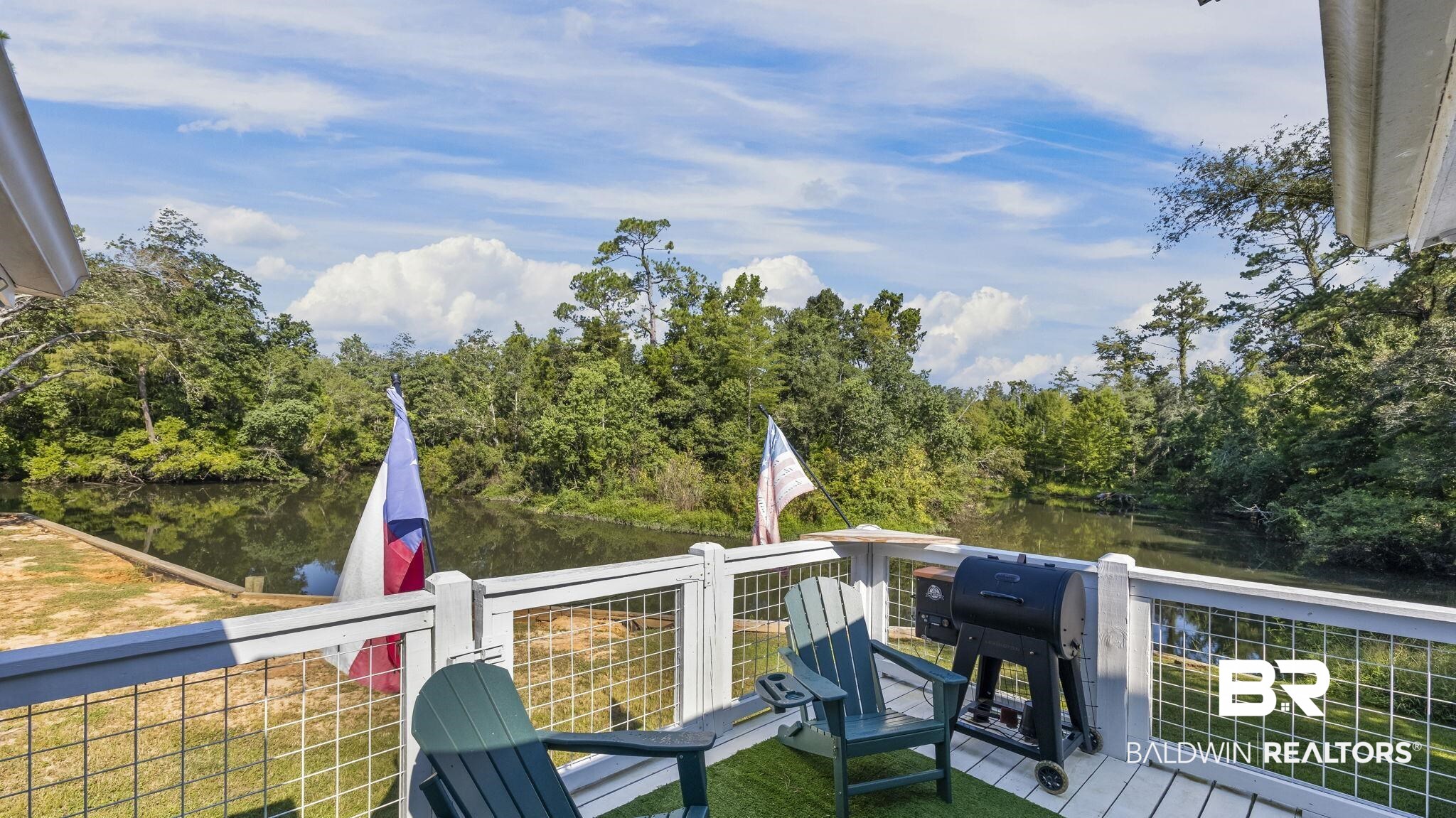 12855 Woodhaven Dairy Road West Silverhill, AL 36576 - Photo 4 of 27 Deck featuring a water view and grilling area