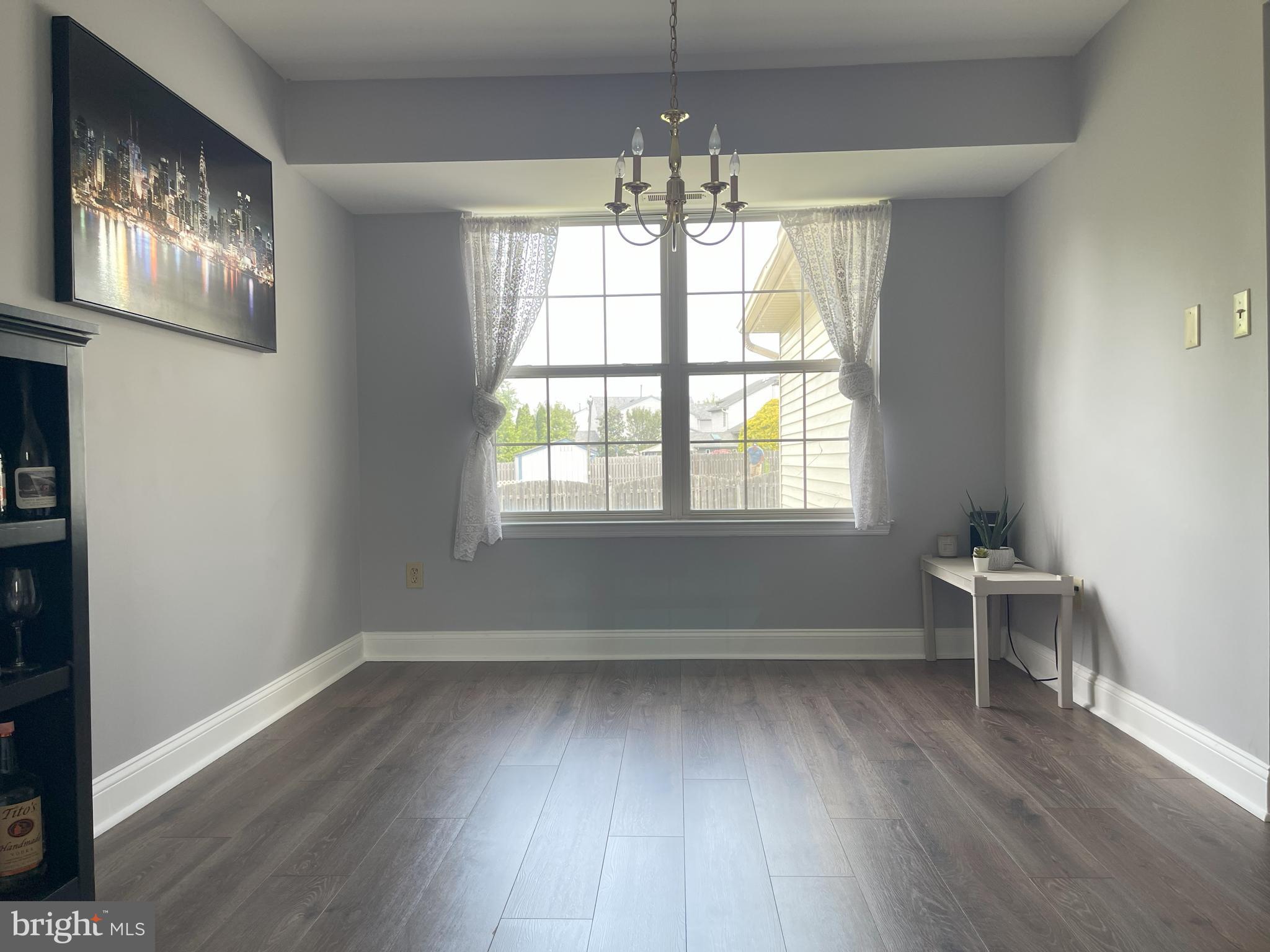 102 Springcress Drive Delran, NJ 08075 - Photo 12 of 50 wooden floor in an empty room with a window