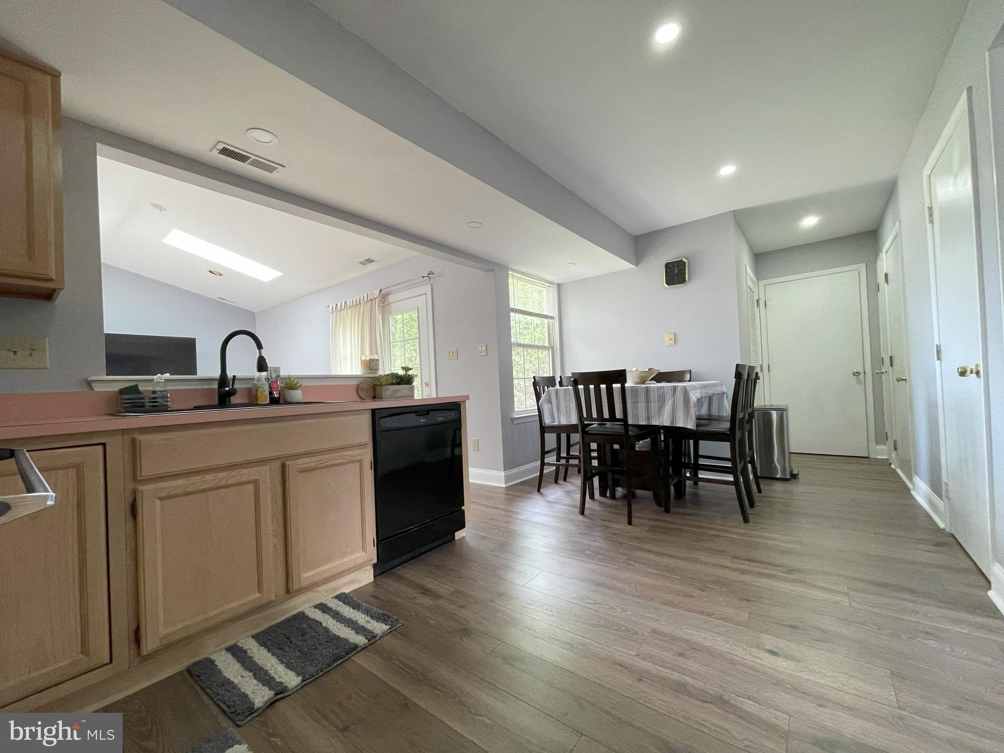 102 Springcress Drive Delran, NJ 08075 - Photo 15 of 50 a kitchen with counter space dining table and chairs