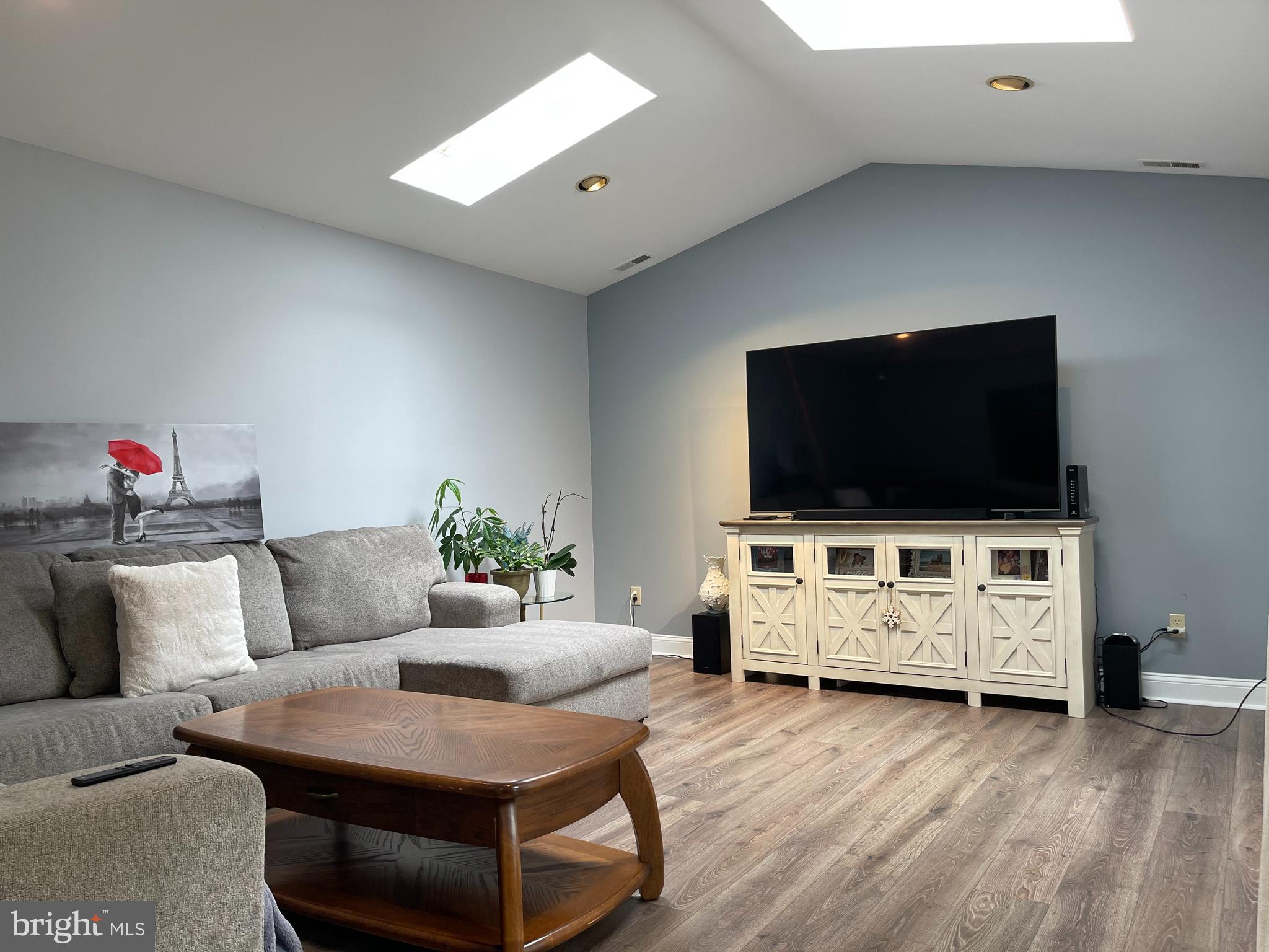 102 Springcress Drive Delran, NJ 08075 - Photo 23 of 50 a living room with furniture and a flat screen tv