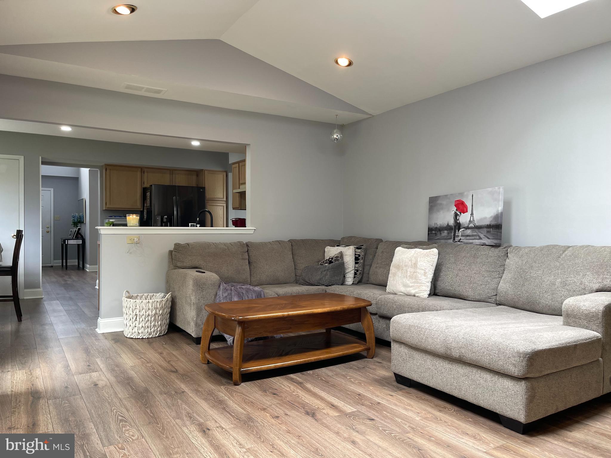 102 Springcress Drive Delran, NJ 08075 - Photo 24 of 50 a living room with furniture and a wooden floor