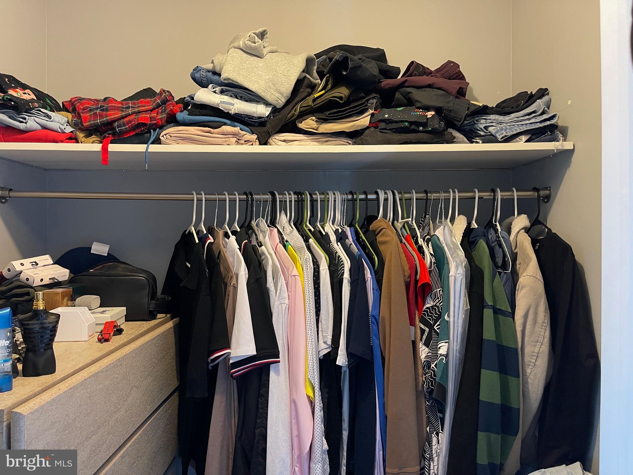 102 Springcress Drive Delran, NJ 08075 - Photo 32 of 50 a view of walk in closet with clothes and shoes