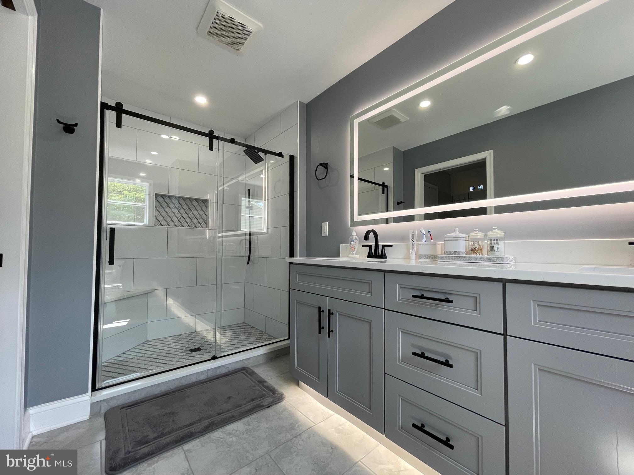 102 Springcress Drive Delran, NJ 08075 - Photo 36 of 50 a bathroom with a granite countertop sink mirror and double
