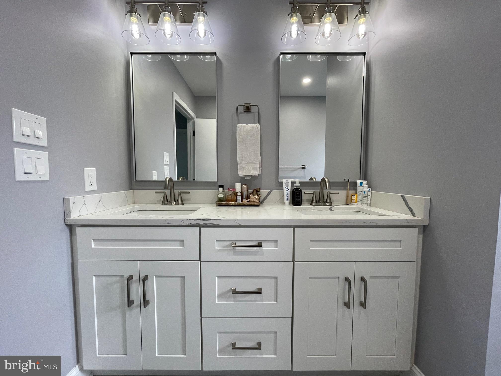 102 Springcress Drive Delran, NJ 08075 - Photo 40 of 50 a bathroom with white cabinets and sink