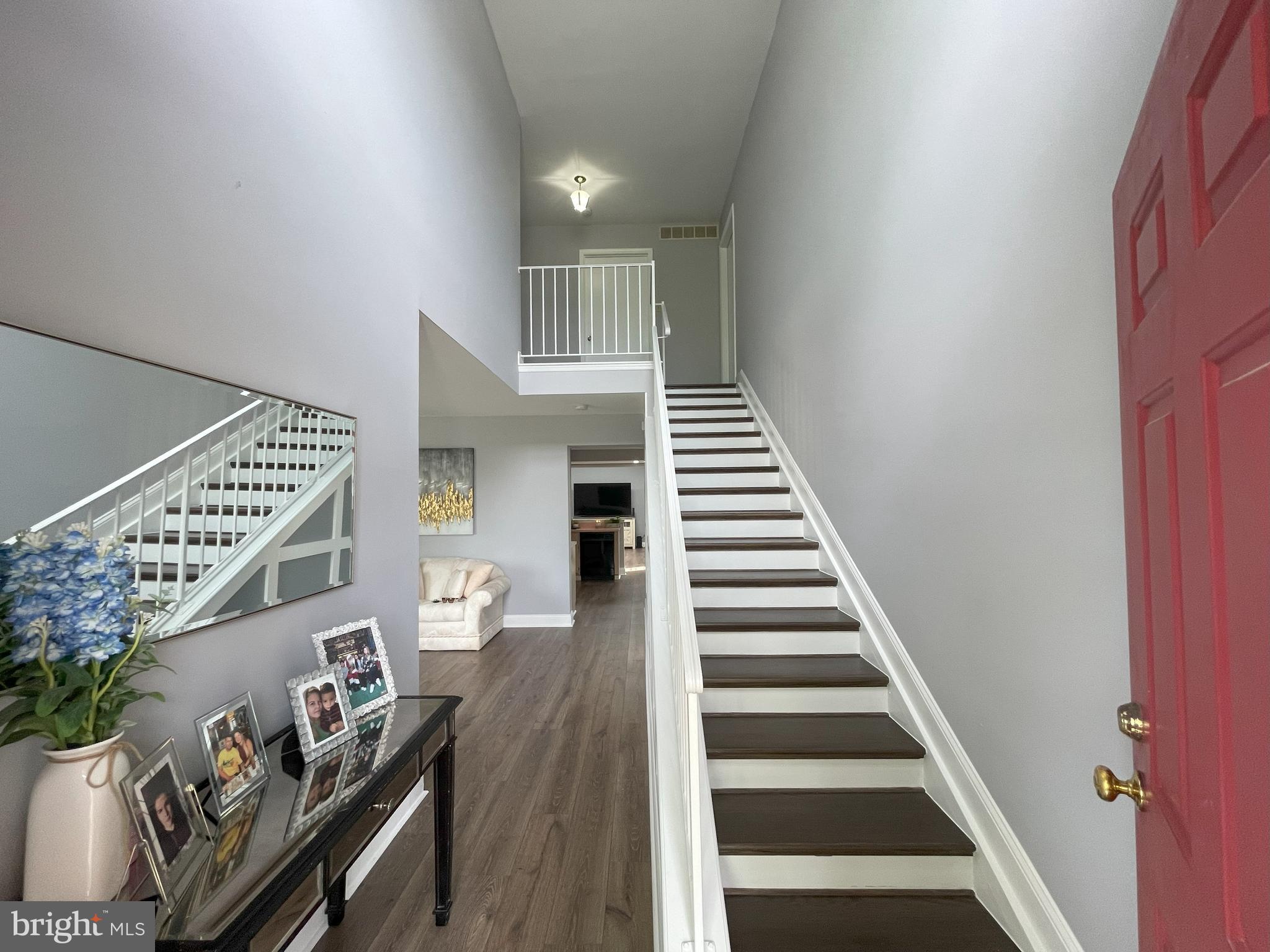 102 Springcress Drive Delran, NJ 08075 - Photo 4 of 50 a view of entryway and hall with wooden floor