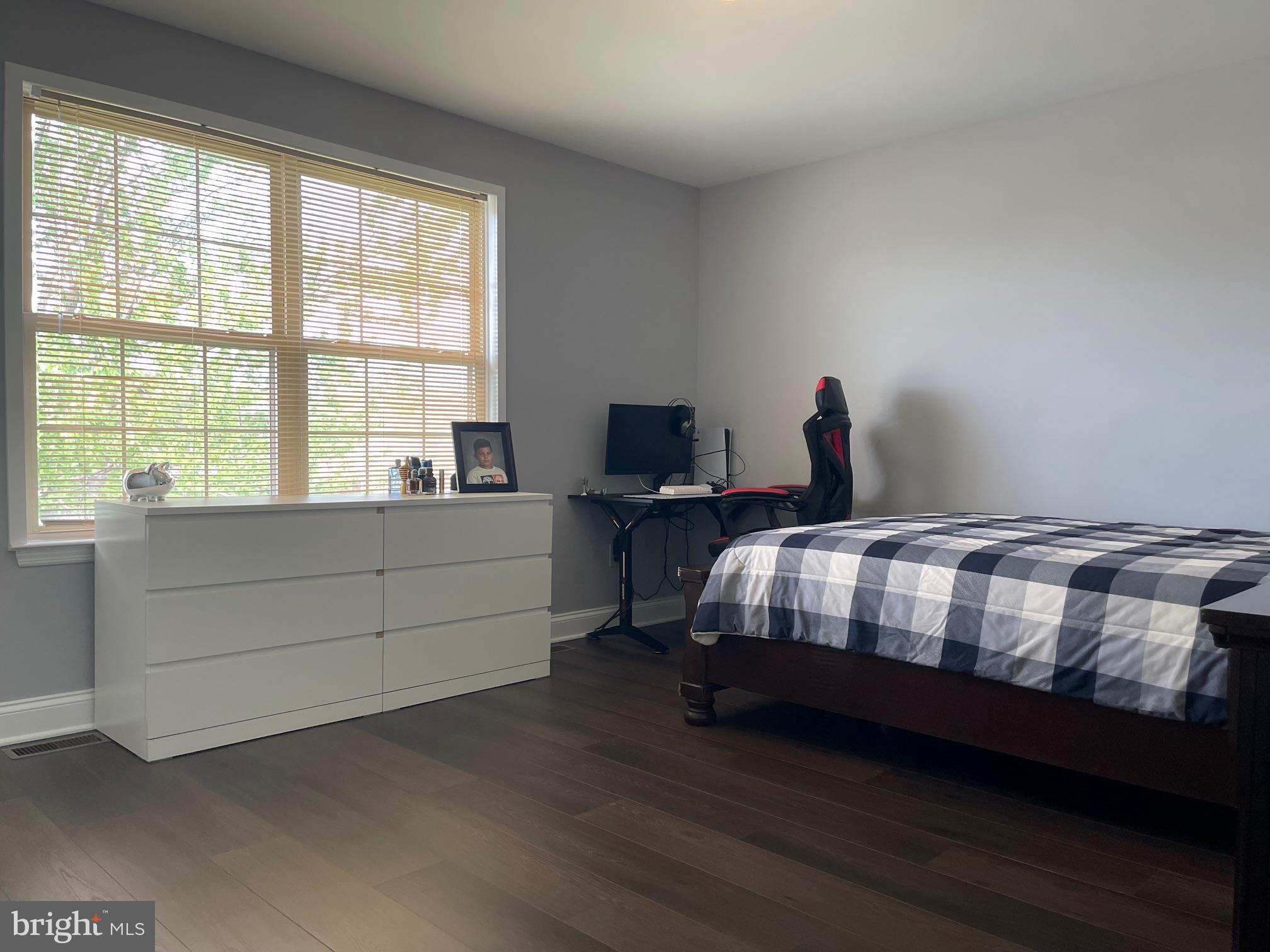 102 Springcress Drive Delran, NJ 08075 - Photo 43 of 50 a bedroom with a bed and a window