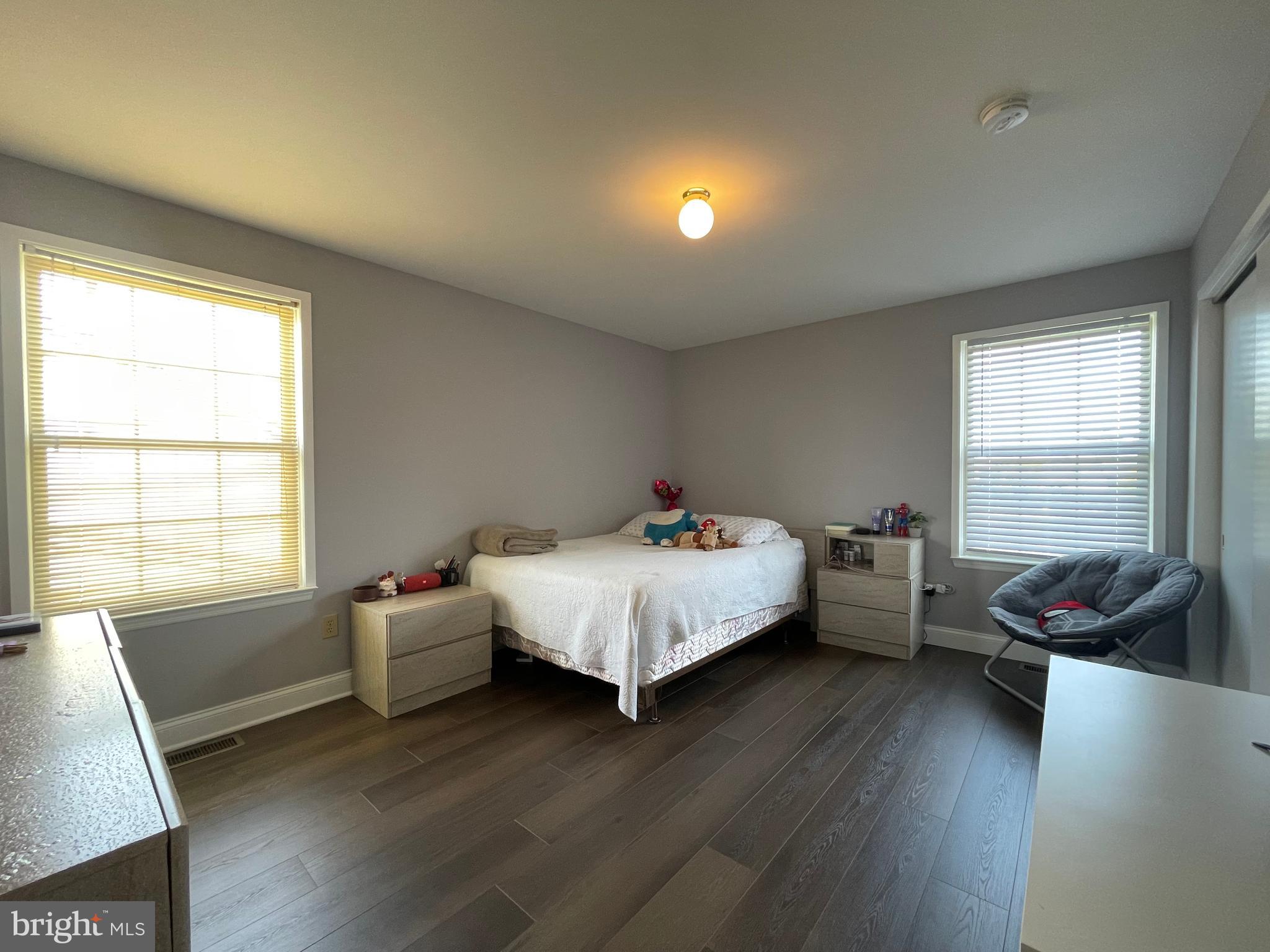 102 Springcress Drive Delran, NJ 08075 - Photo 45 of 50 a bed sitting in a bedroom next to a window