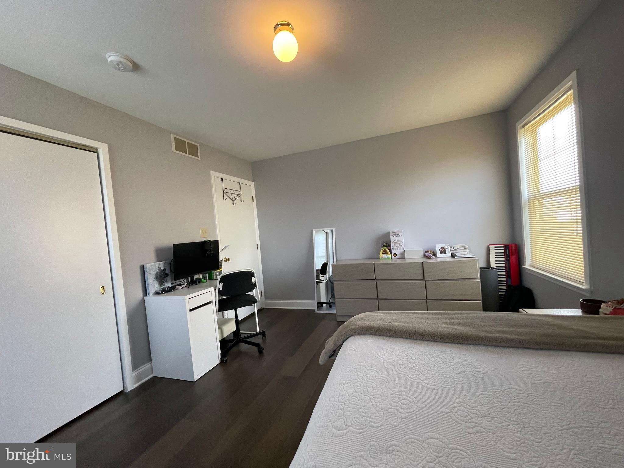 102 Springcress Drive Delran, NJ 08075 - Photo 47 of 50 a bedroom with furniture and a flat screen tv