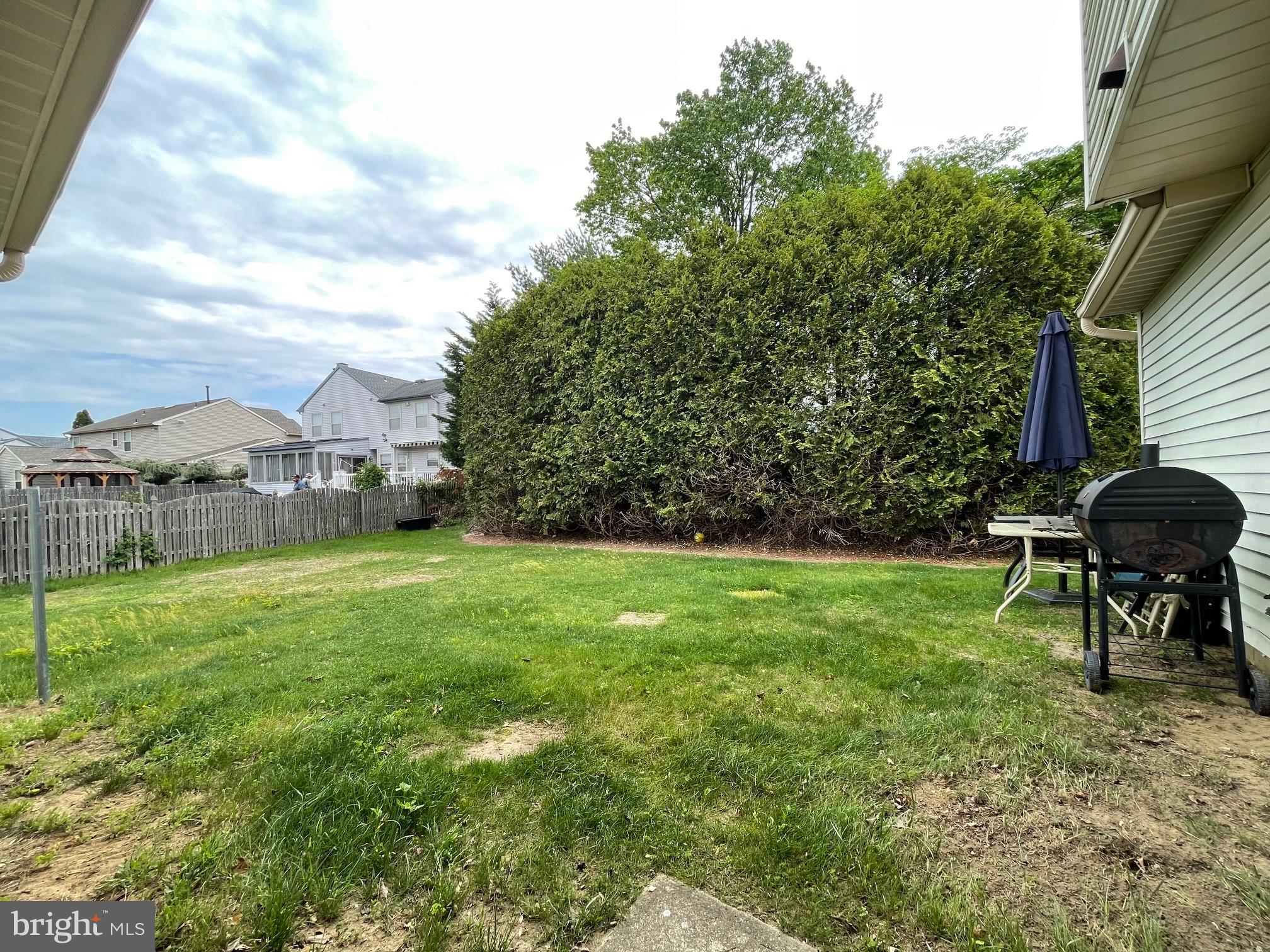 102 Springcress Drive Delran, NJ 08075 - Photo 48 of 50 a view of a house with a backyard