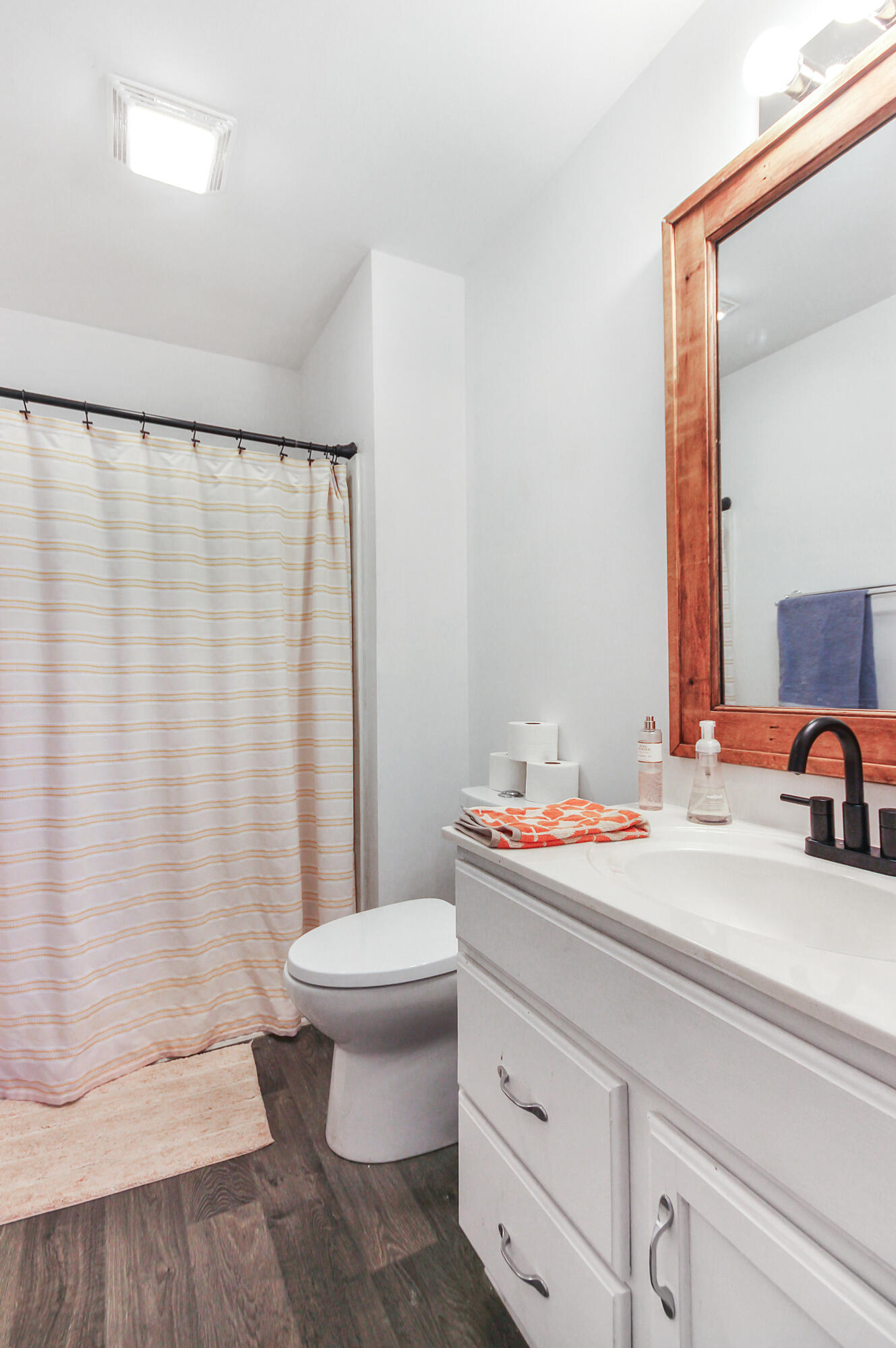 1691 Ruby Court Hobart, IN 46342 - Photo 12 of 27 a bathroom with a sink and a mirror