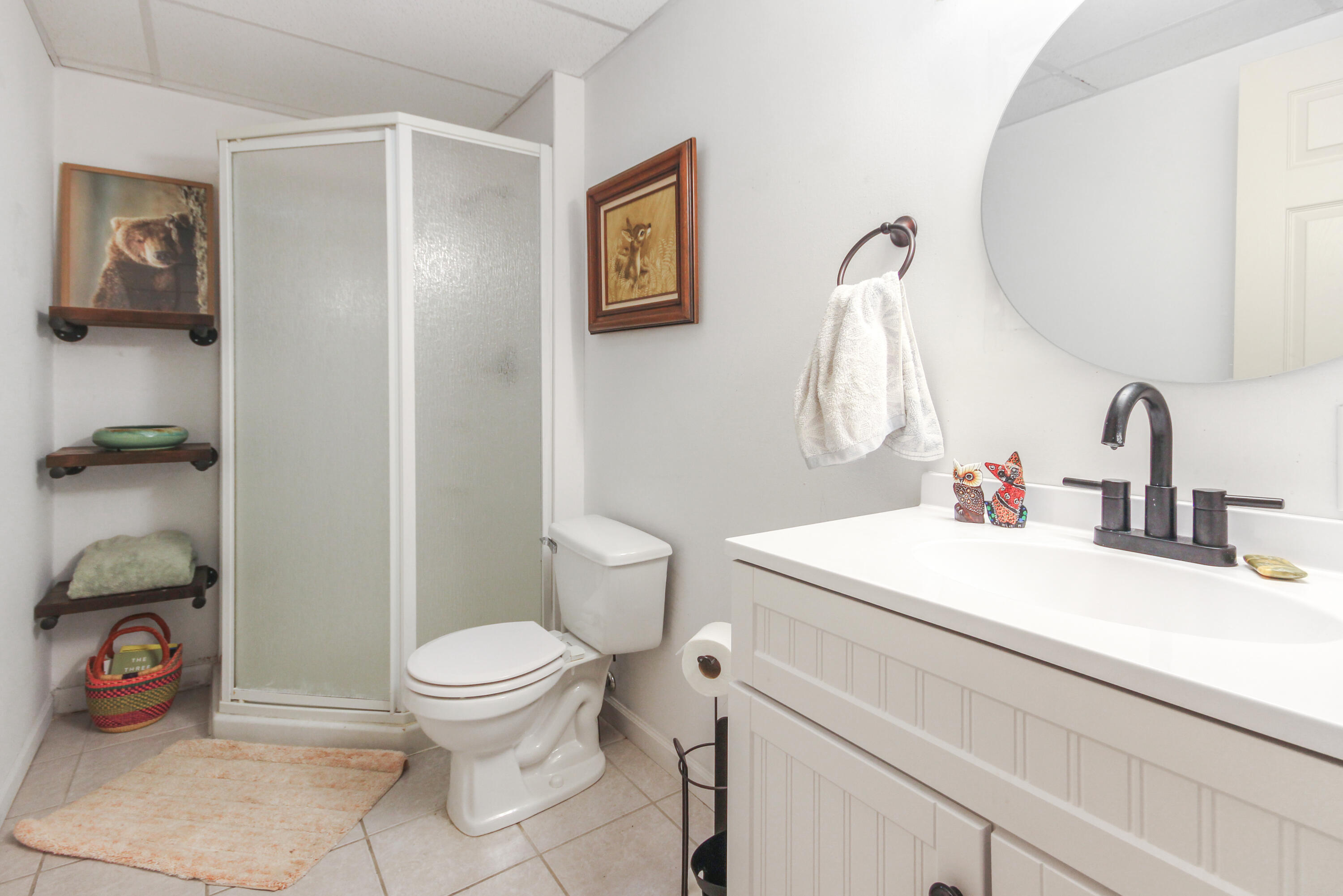 1691 Ruby Court Hobart, IN 46342 - Photo 20 of 27 a bathroom with a sink a toilet and a mirror