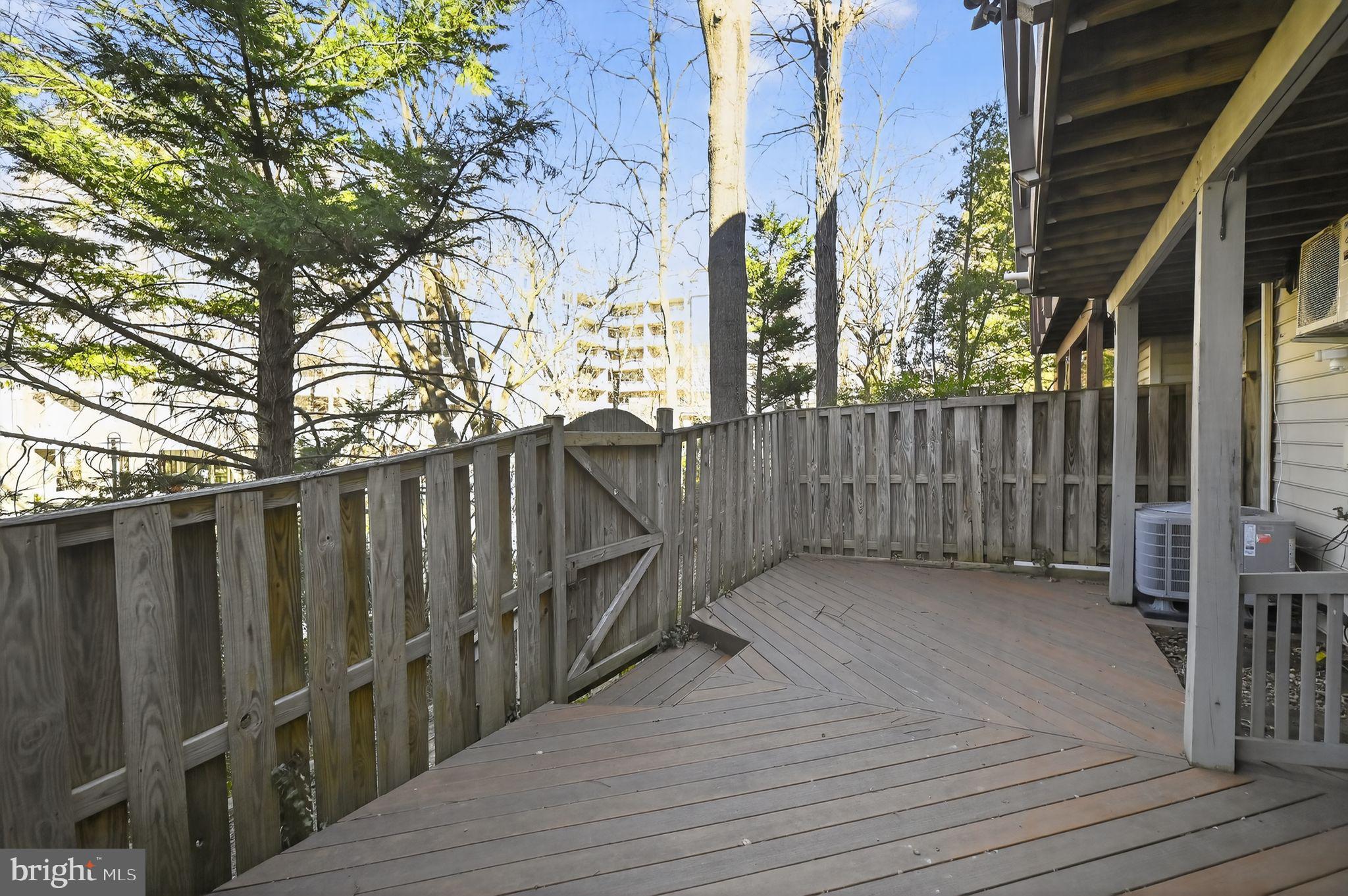 128 Rees Place Falls Church, VA 22046 - Photo 46 of 47 a view of a wooden fence and a pathway