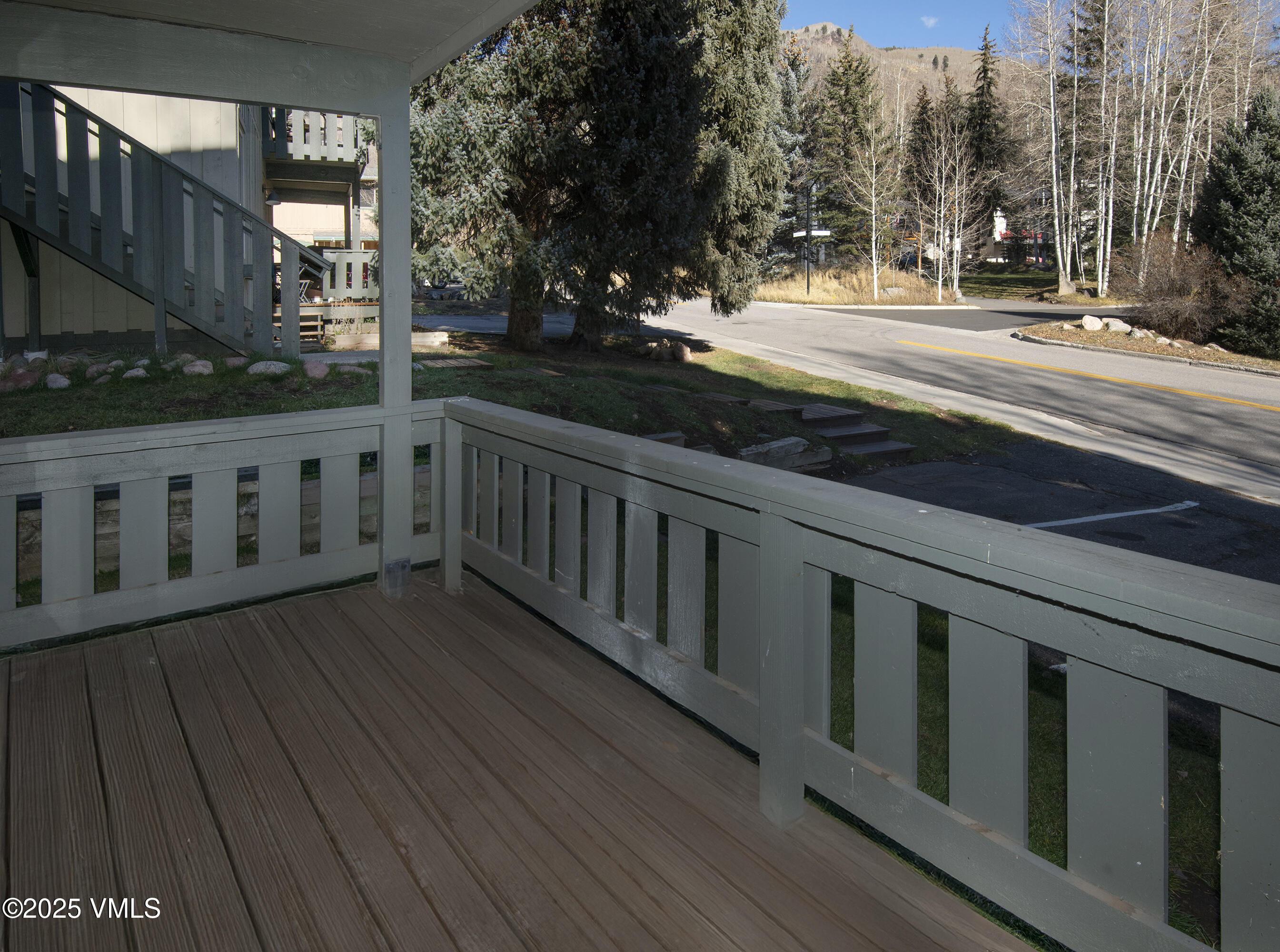 921 Red Sandstone Road, Unit A Vail, CO 81657 - Photo 23 of 26 a view of street with wooden deck