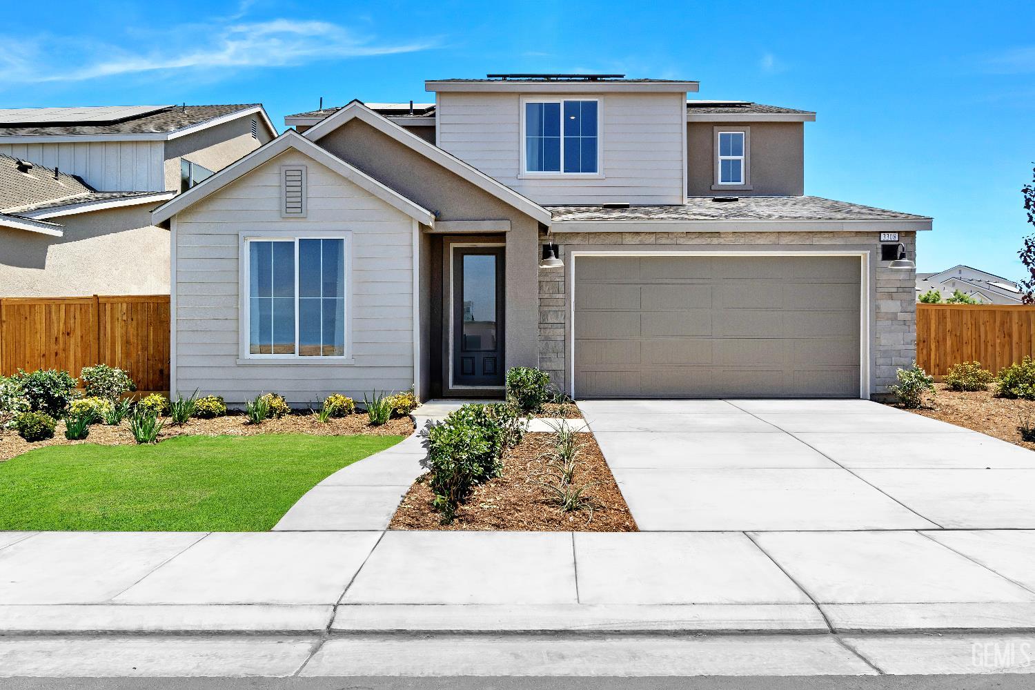 Undisclosed Address Shafter, CA 93263 - Photo 1 of 21 a front view of a house with a yard and garage