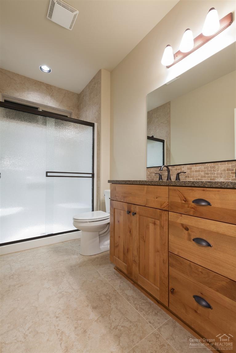 61053 Manhae Loop Bend, OR 97702 - Photo 4 of 25 3rd full bath. Photo of similar home - s