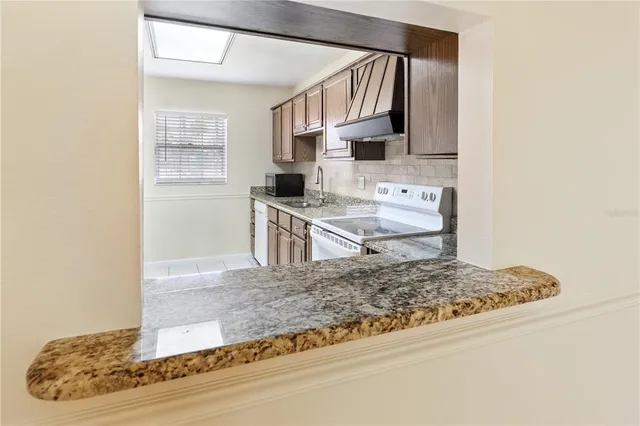 a view of a kitchen cabinets