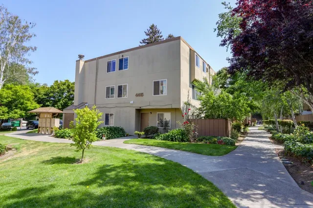 a house view with a garden space